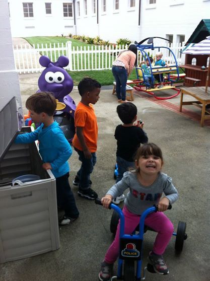 Kids in Outdoor Play Area, Daycare Center in San Francisco CA