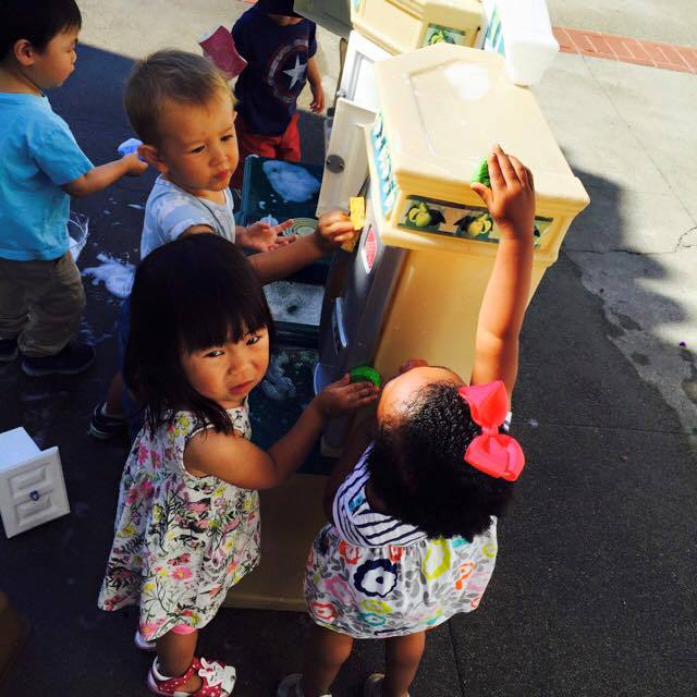 Kids at Outdoor Kitchen Playset, Daycare Center in Marin CA