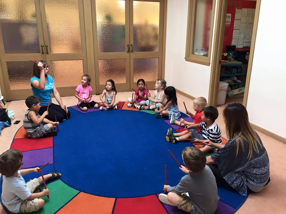 Kids & Teacher on Circular Mat, Preschool Center in San Francisco CA