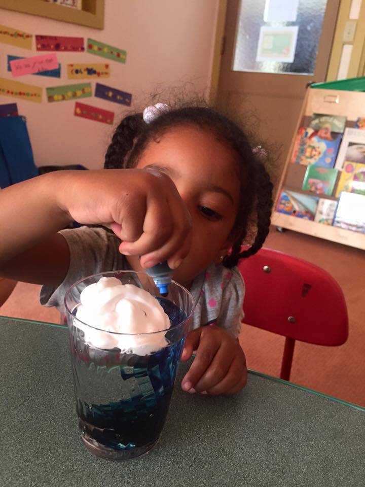 Child Mixing Water & Food Coloring, Preschool Center in Marin CA