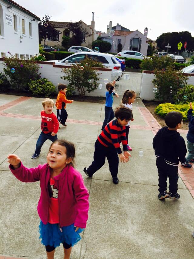Kids Playing in Courtyard, Preschool Center in San Francisco CA