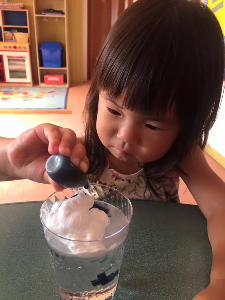 Child Mixing Water & Food Coloring, Daycare Center in Novato CA