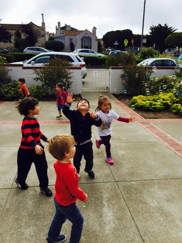 Children Playing in Outdoor Courtyard, Daycare Center in Novato CA
