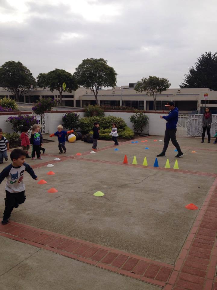 Kids Playing Games in Courtyard, Preschool Center in San Francisco CA