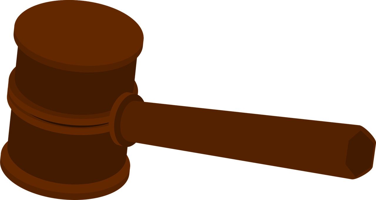 Professional arbitrator reviewing contracts, evidence, and legal documents before issuing a binding