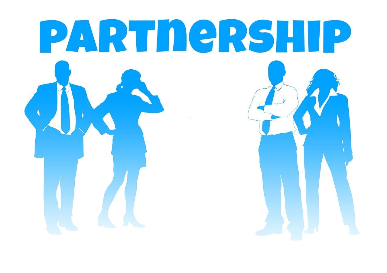 Business partners reviewing a breached contract and preparing documents for online arbitration