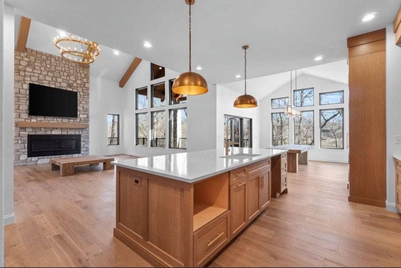 A kitchen with a large island in the middle of it
