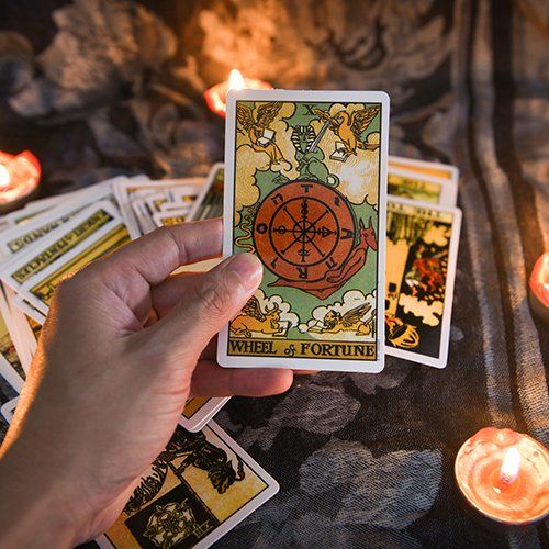 Holding A Tarot Card — Atlanta, GA — Psychic Indian Healer