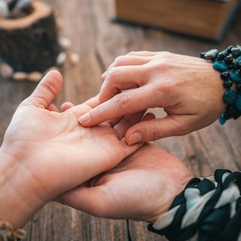 Reading Customer's Palm — Atlanta, GA — Psychic Indian Healer