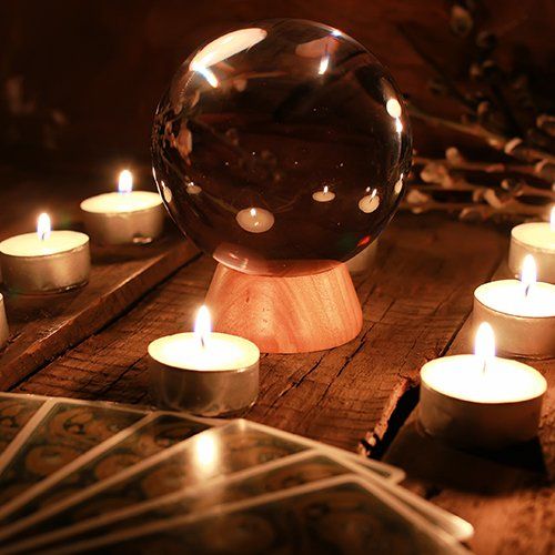 Crystal Ball Surrounded by Candles — Atlanta, GA — Psychic Indian Healer