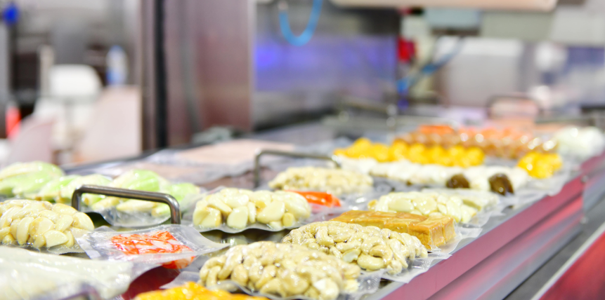 A display case filled with lots of different types of food.