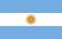 The flag of argentina is blue and white with a sun in the middle.