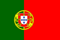A red and green flag with a coat of arms in the middle.