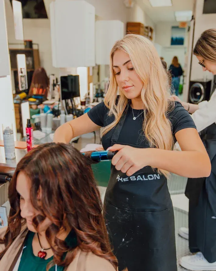 Man holding sign reading