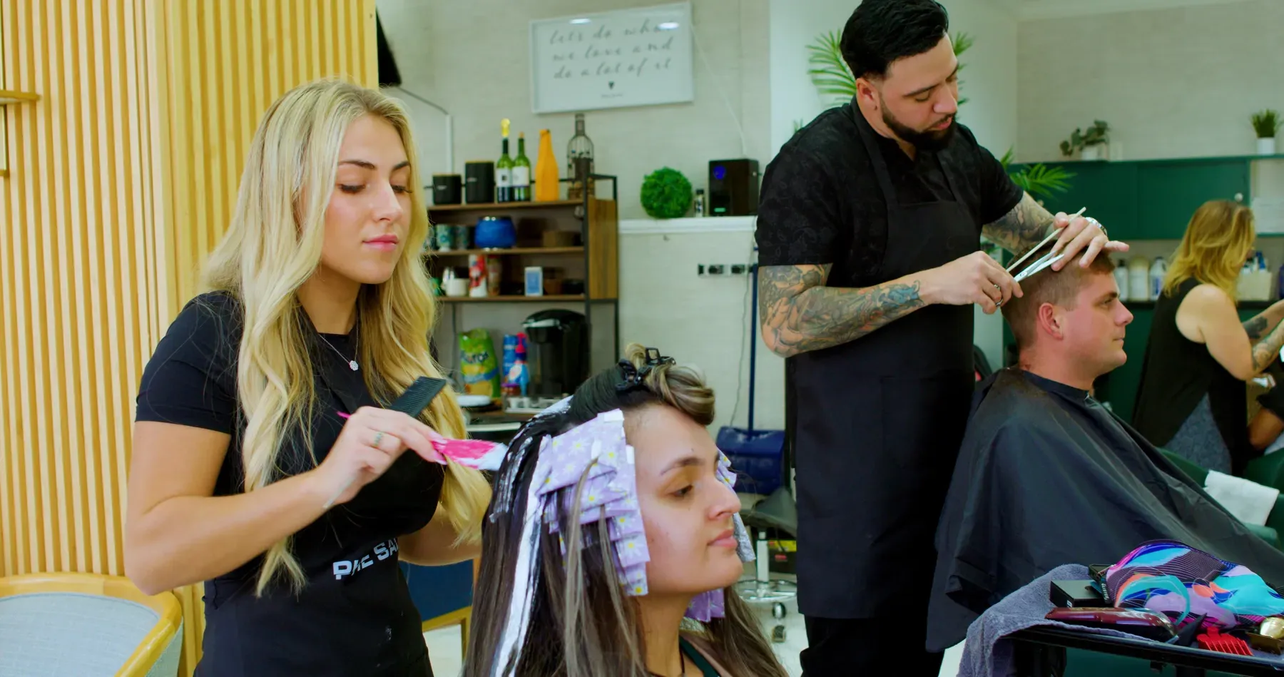 Man holding sign reading