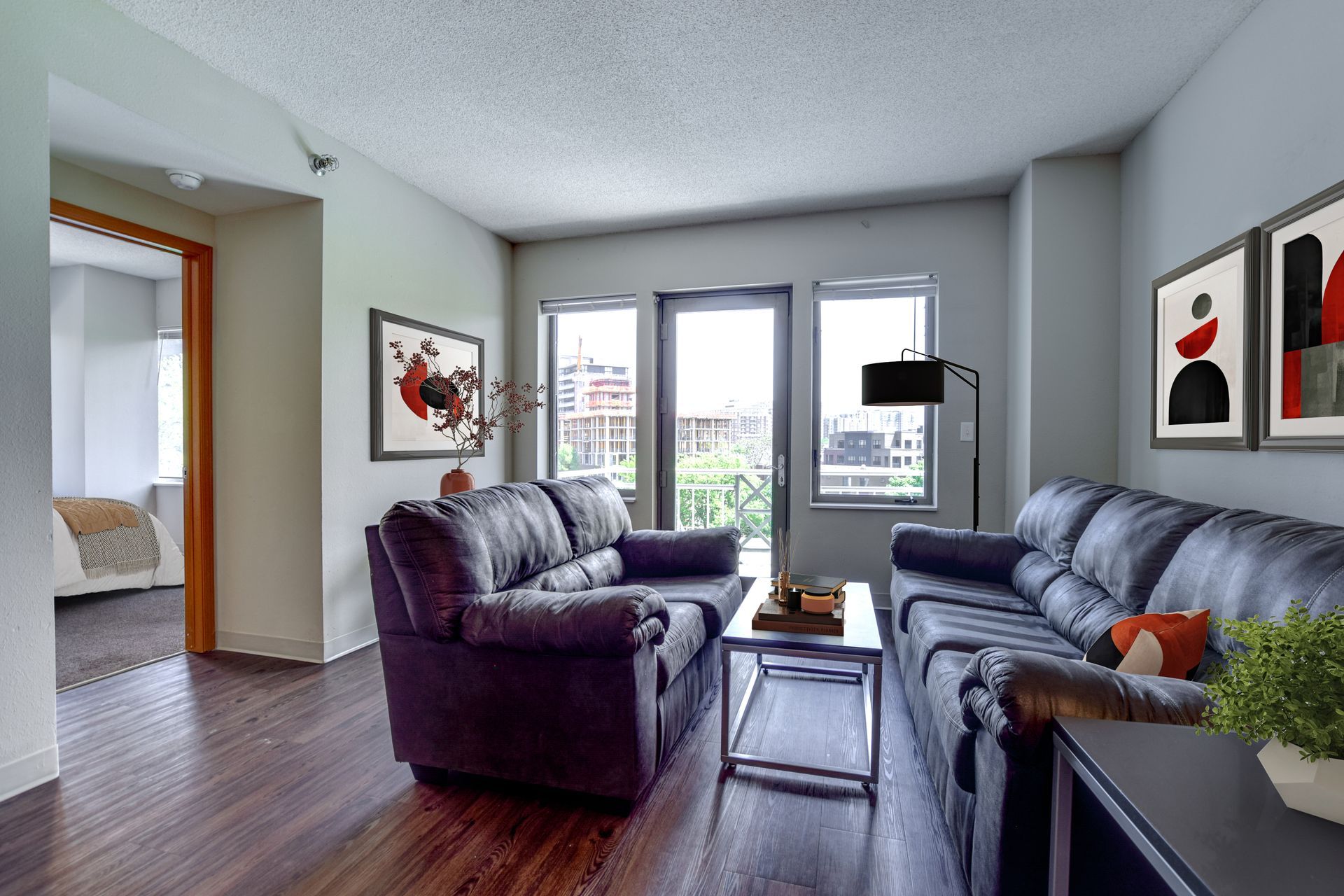 A living room with a couch and a coffee table