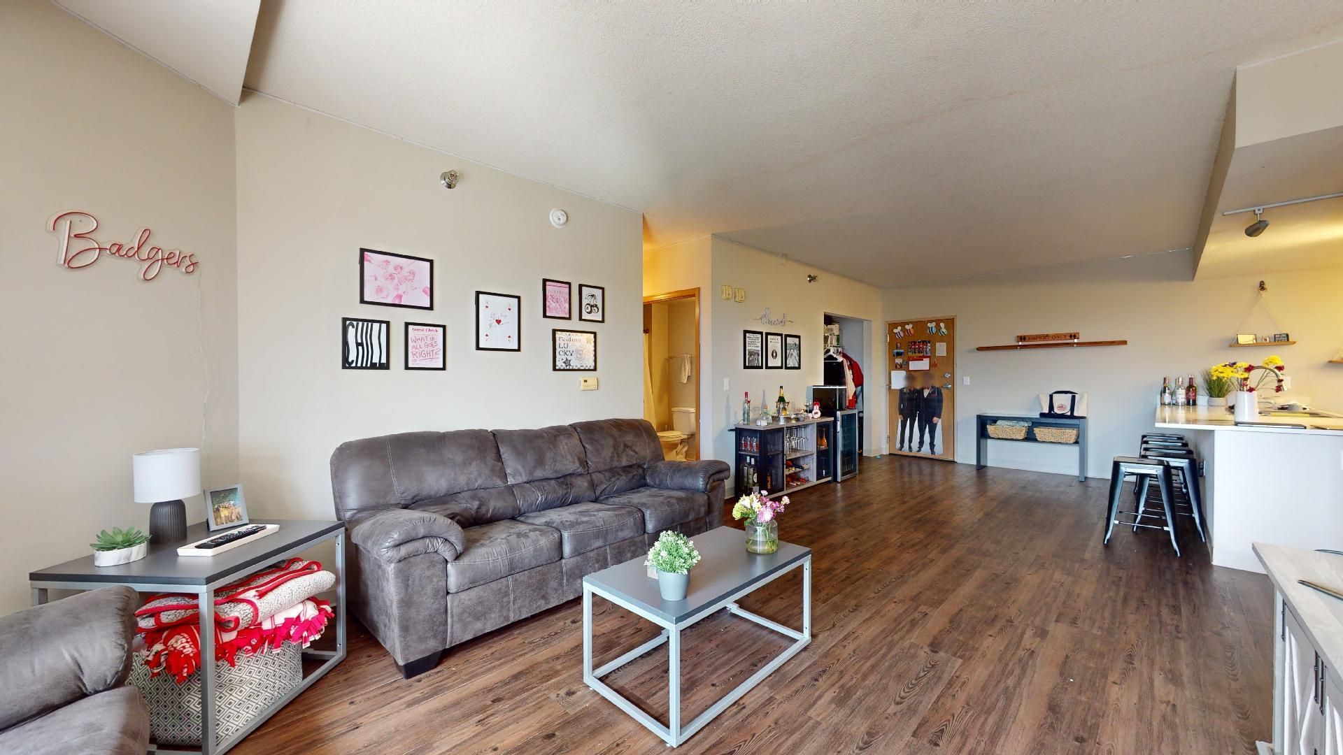 A living room with a couch and a coffee table