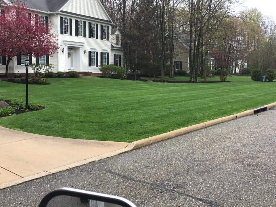 House with Green Lawn — Atwater, OH — Northern Buckeye Lawn & Landscape