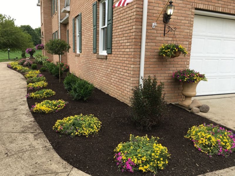 Brick House with Flowers — Atwater, OH — Northern Buckeye Lawn & Landscape