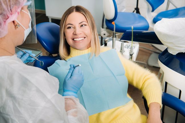 girl smiles at the dentist
