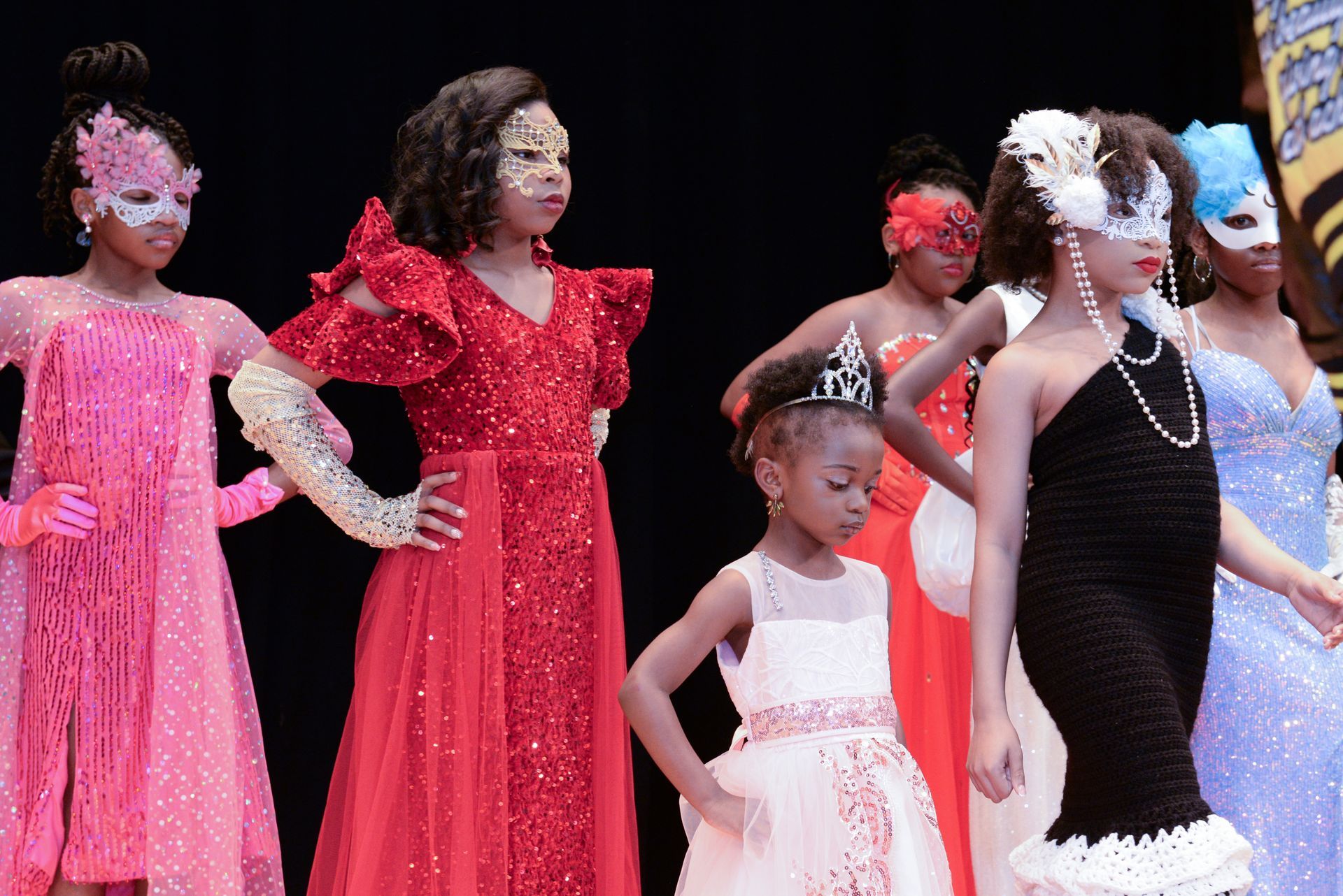 a girl wearing a red shirt that says 