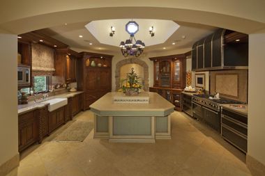 a huge kitchen with chandelier