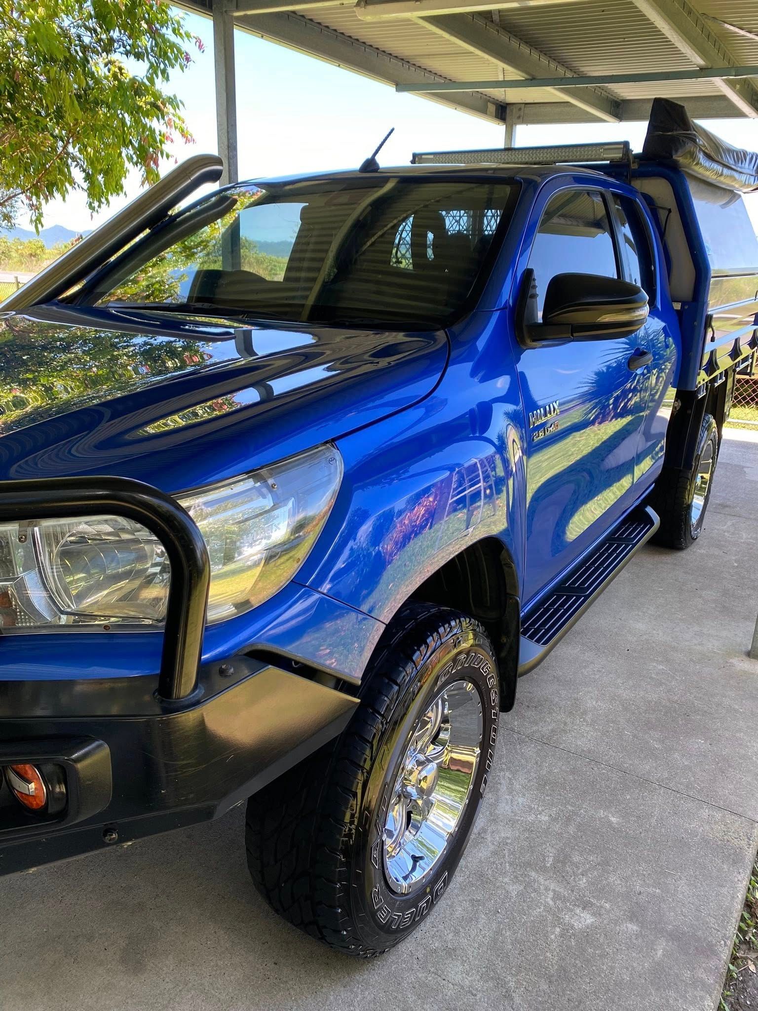 Blue Pickup Truck Parked Under a Shaded Structure — Detailed By Dan In Gordonvale, QLD