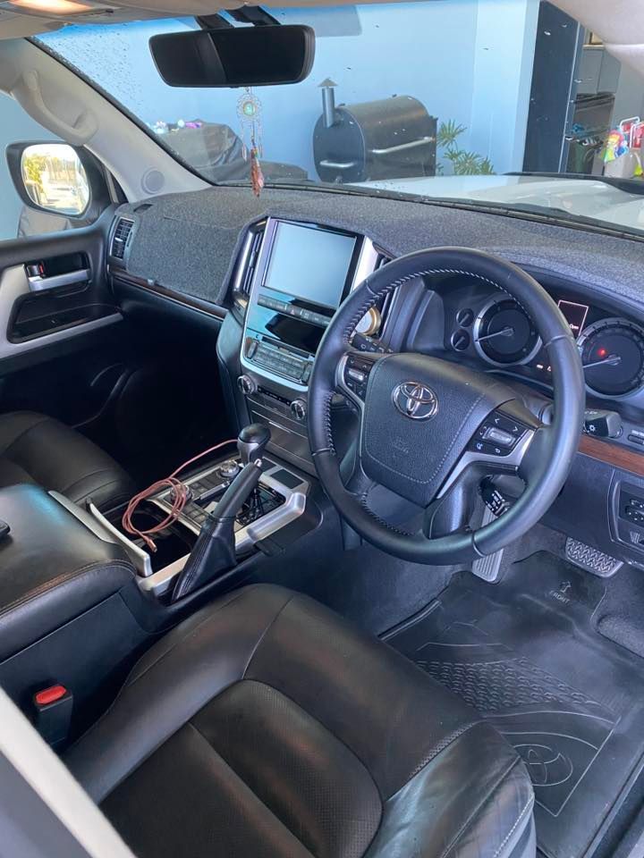 Interior View of a Black Toyota Land Cruiser With a Steering Wheel — Detailed By Dan In Innisfail, QLD