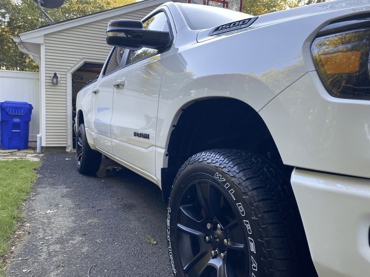 White Ram Truck Parked on Driveway Next to a Garage — Detailed By Dan In Mirriwinni, QLD