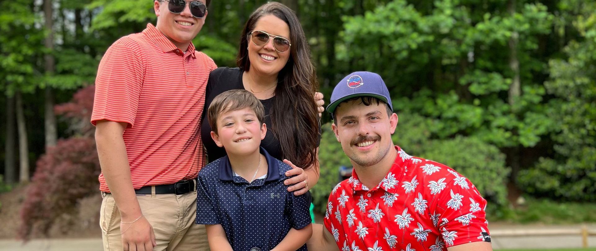 Charity Golf International Pro, Andrew Eigner, meeting with the family that hosts a charity event