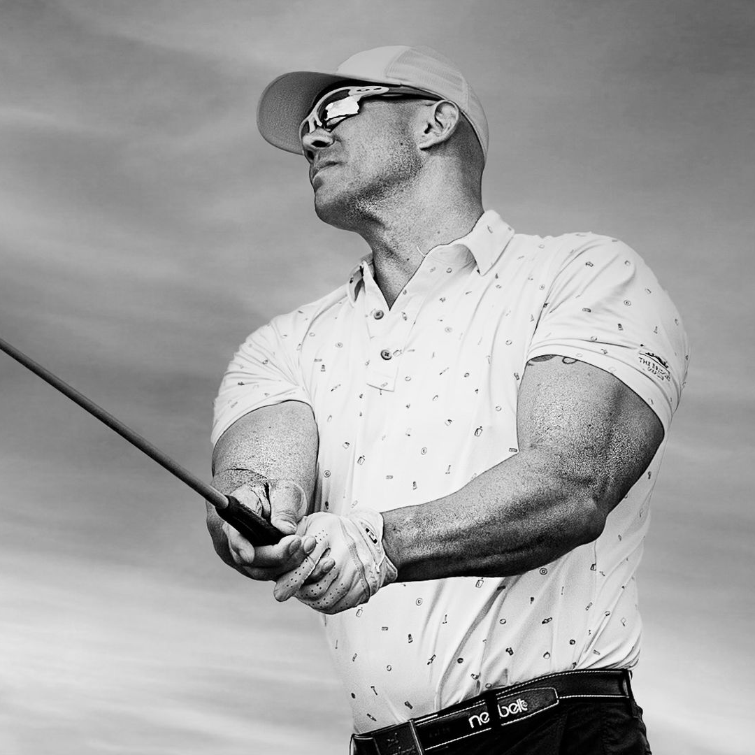 A man holding a trophy that says wild on it