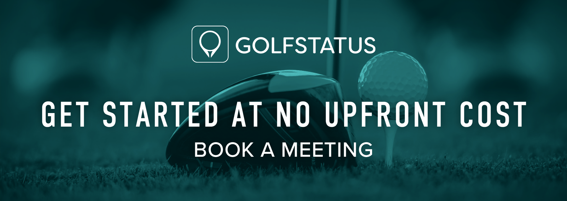 The head of a golf club next to a golf ball on a tee.