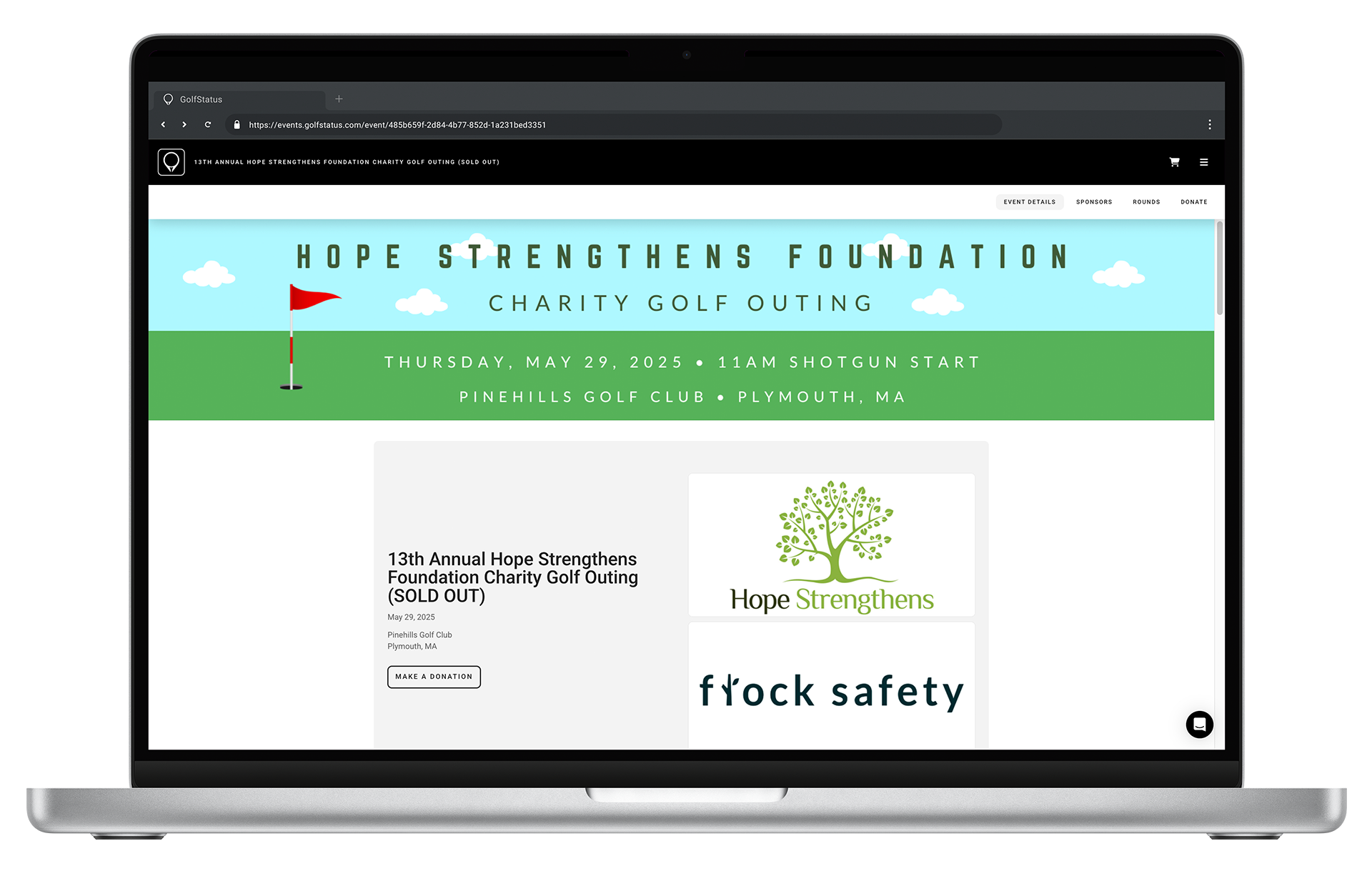 The home page of a golf tournament website is displayed on a laptop computer.
