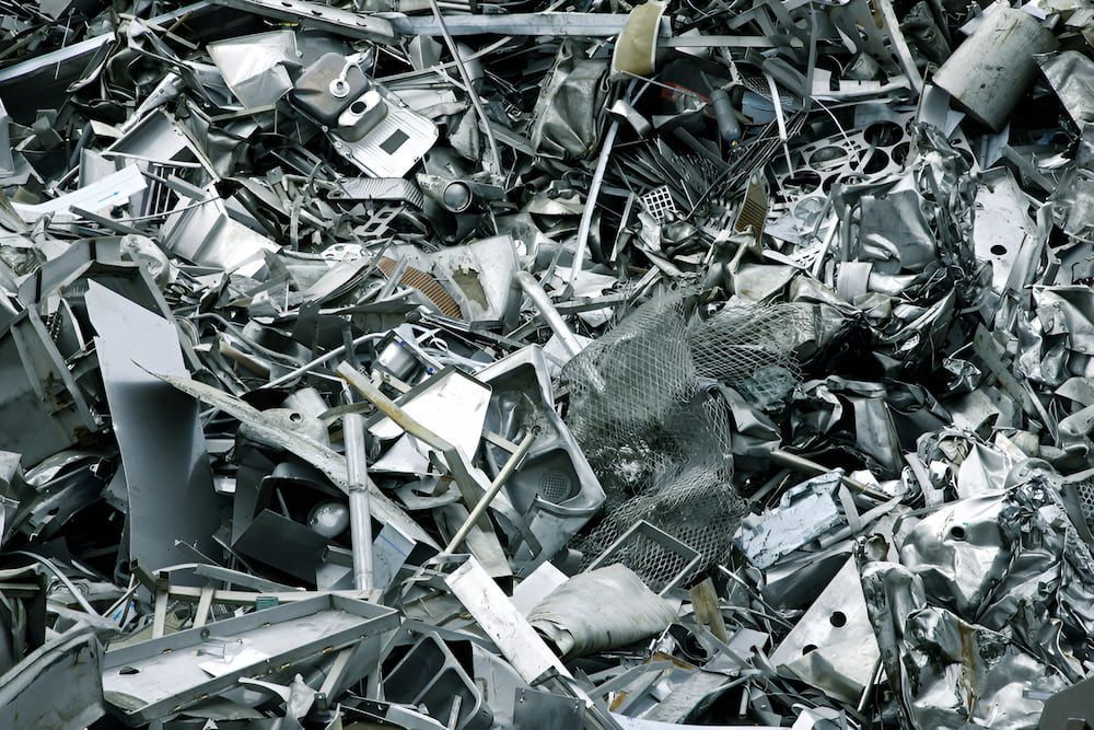 A Pile Of Scrap Metal Is Sitting On Top Of Each Other — Antons Recycling In Ciccone, NT
