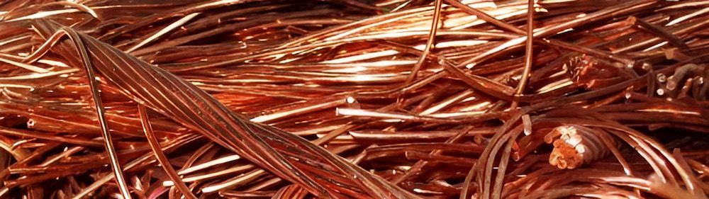 A Pile Of Copper Wire Is Sitting On Top Of A Pile Of Copper Wire — Antons Recycling In Ciccone, NT