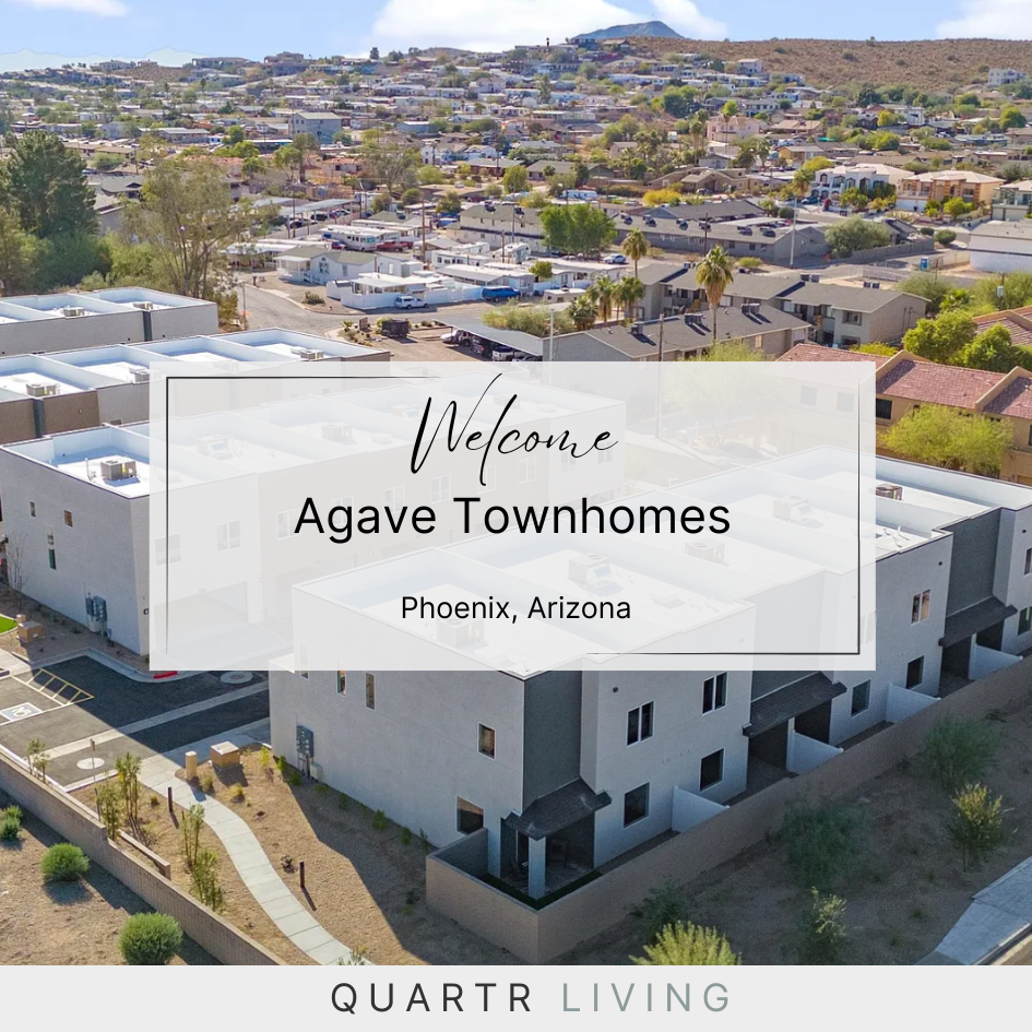 Aerial view of Agave Townhomes in Phoenix, Arizona. Townhouses are modern, with a backdrop of a hillside community.