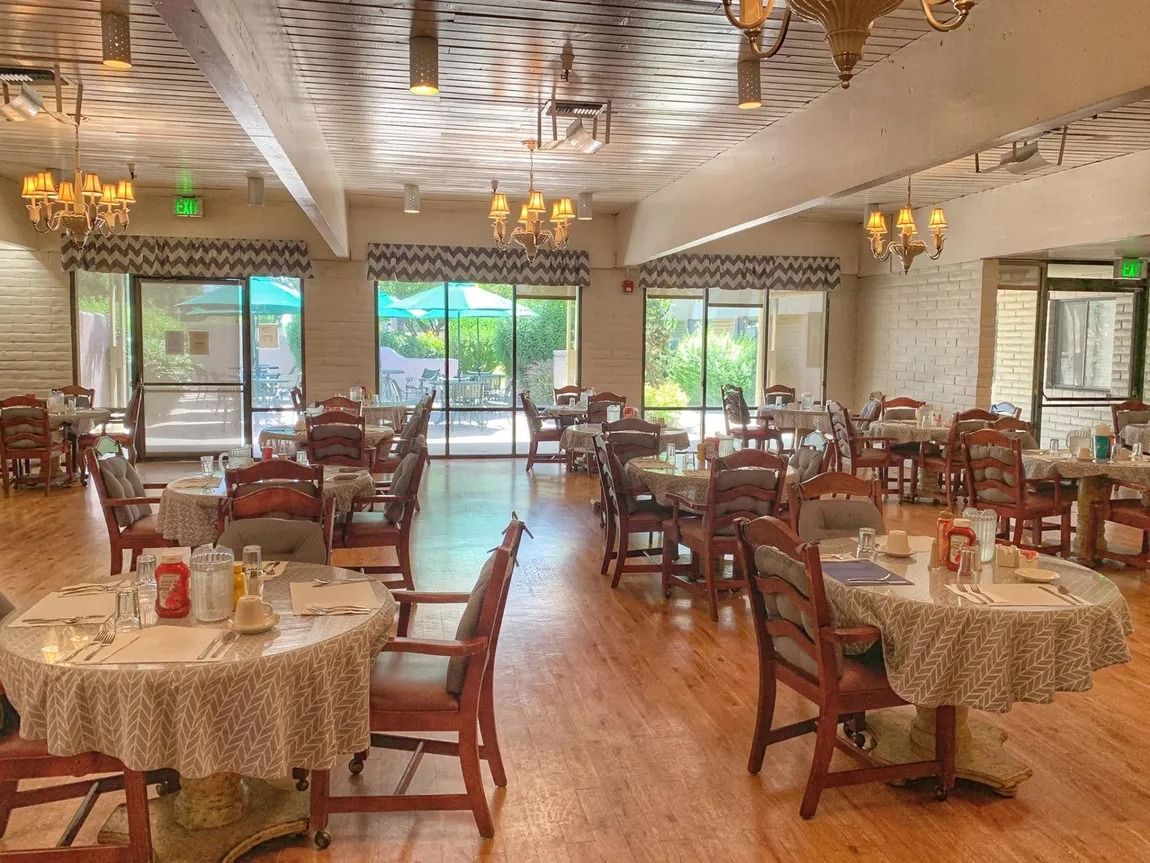 A large dining room filled with tables and chairs.