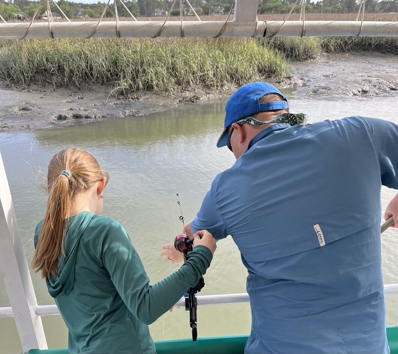Dad and daughter crabbing in Hilton Head Island, SC