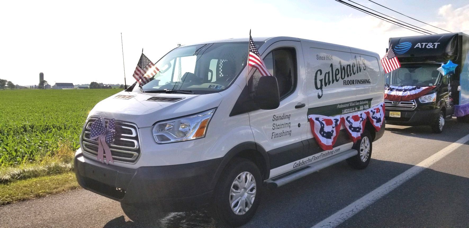 A white Galebach’s Floor Finishing van is parked on the side of the road.