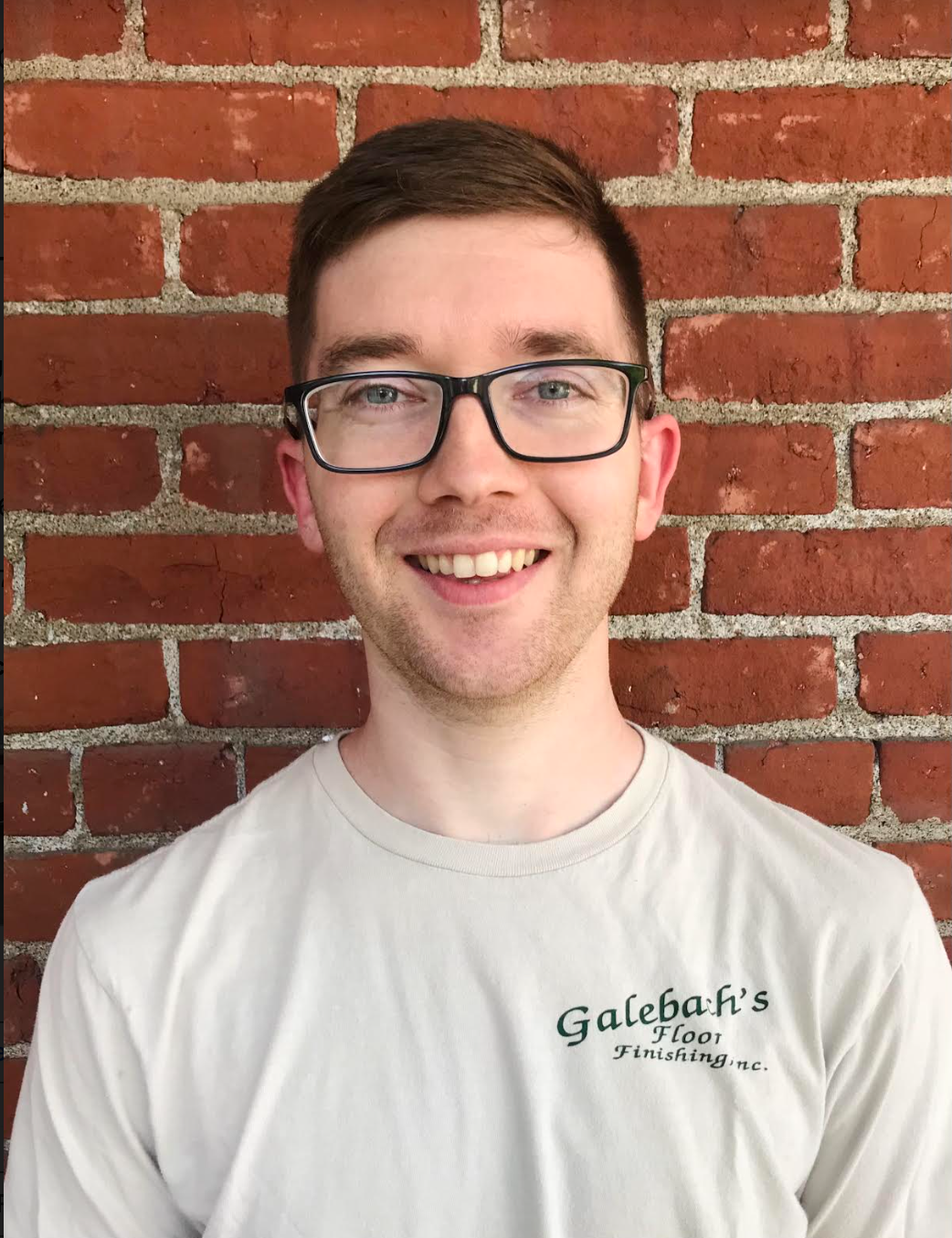 A cartoon illustration of a young man wearing a green shirt Galebach’s Floor Finishing