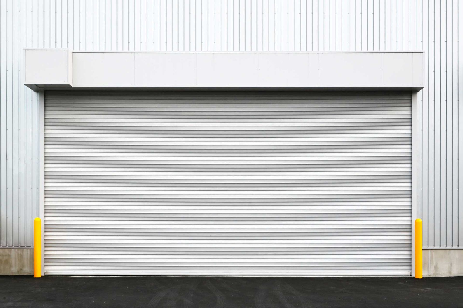 View of a business garage door representing garage door repair showcasing durability and style. View of a business garage door representing garage door repair showcasing durability and style.