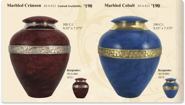 Two urns for sale: one marbled crimson, one marbled cobalt, each with a matching smaller keepsake urn.