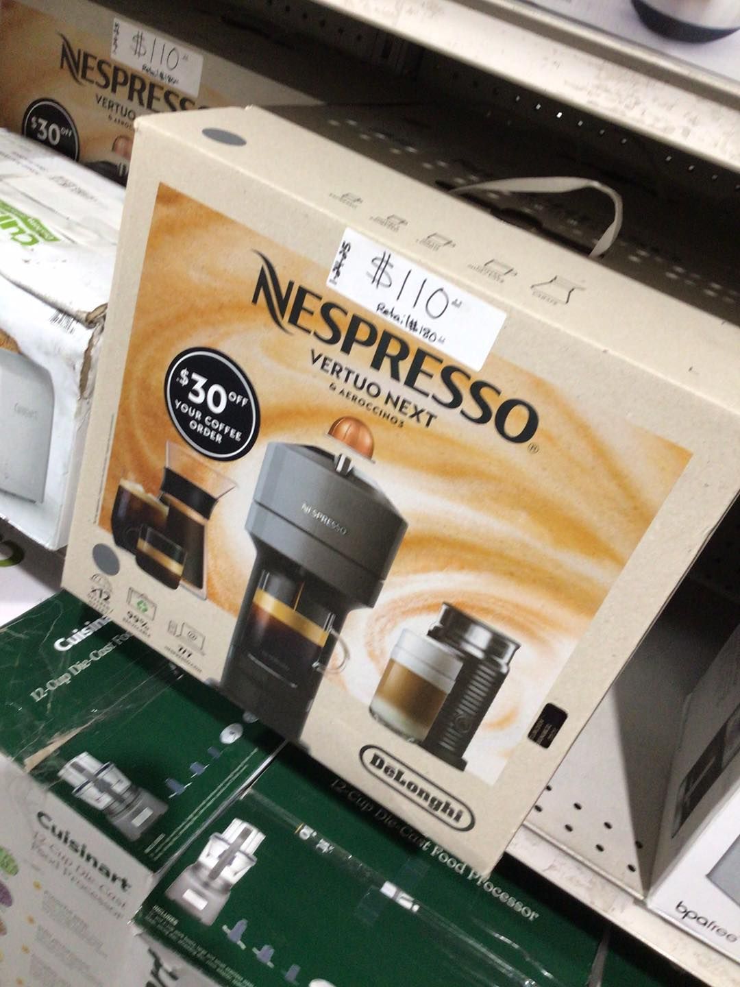 A box of nespresso vertuo next coffee maker