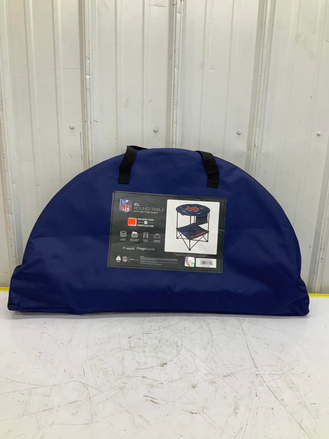 A blue bag with a picture of a table on it