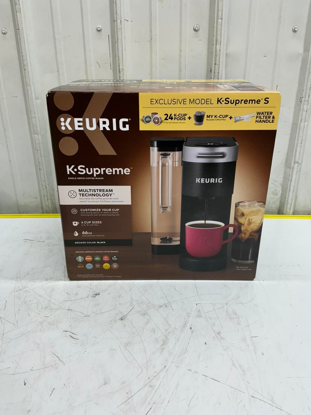 A keurig k supreme coffee maker in a box
