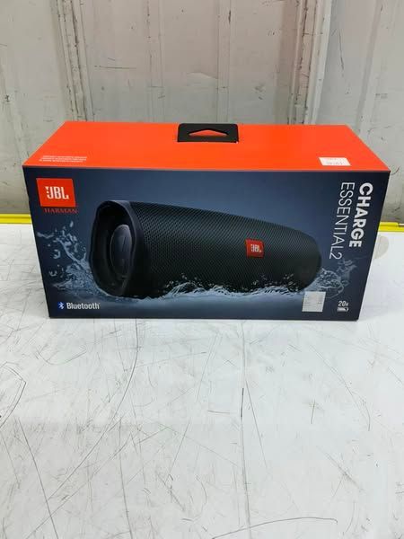 A jbl charge essentials speaker in a box