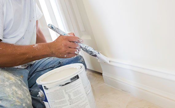 Man Painting Wood Trim — Olympia, WA — Puget Painting & Home Repair LLC