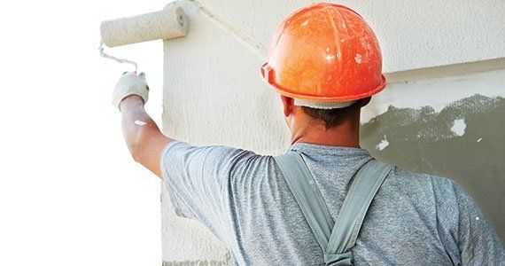 Man Painting the Wall — Olympia, WA — Puget Painting & Home Repair LLC