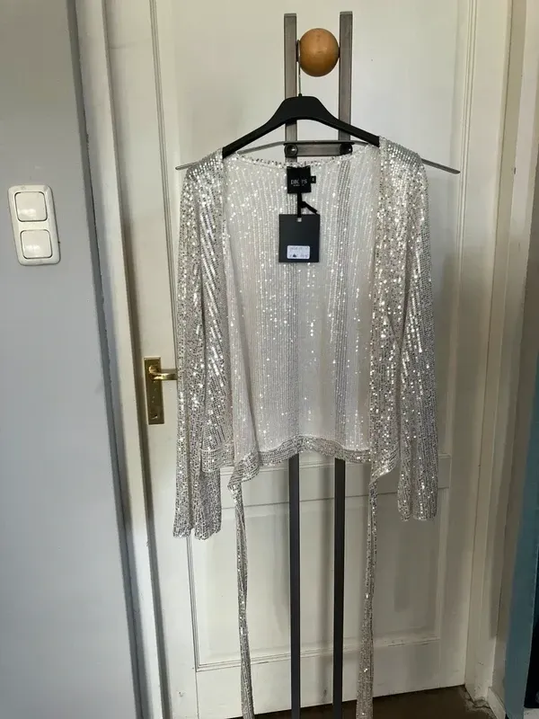 Feestelijk vestje NÜ Denmark