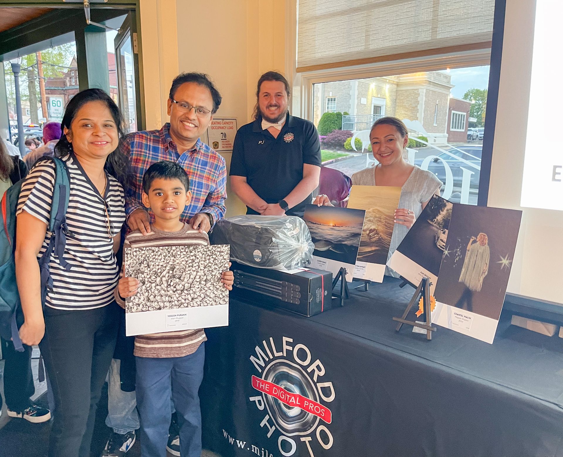 1st Place winner Yogesh Puranik with family and Milford Photo's Pj and Anastasia